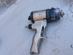 Pistola poliurea con soporte inaceptable
